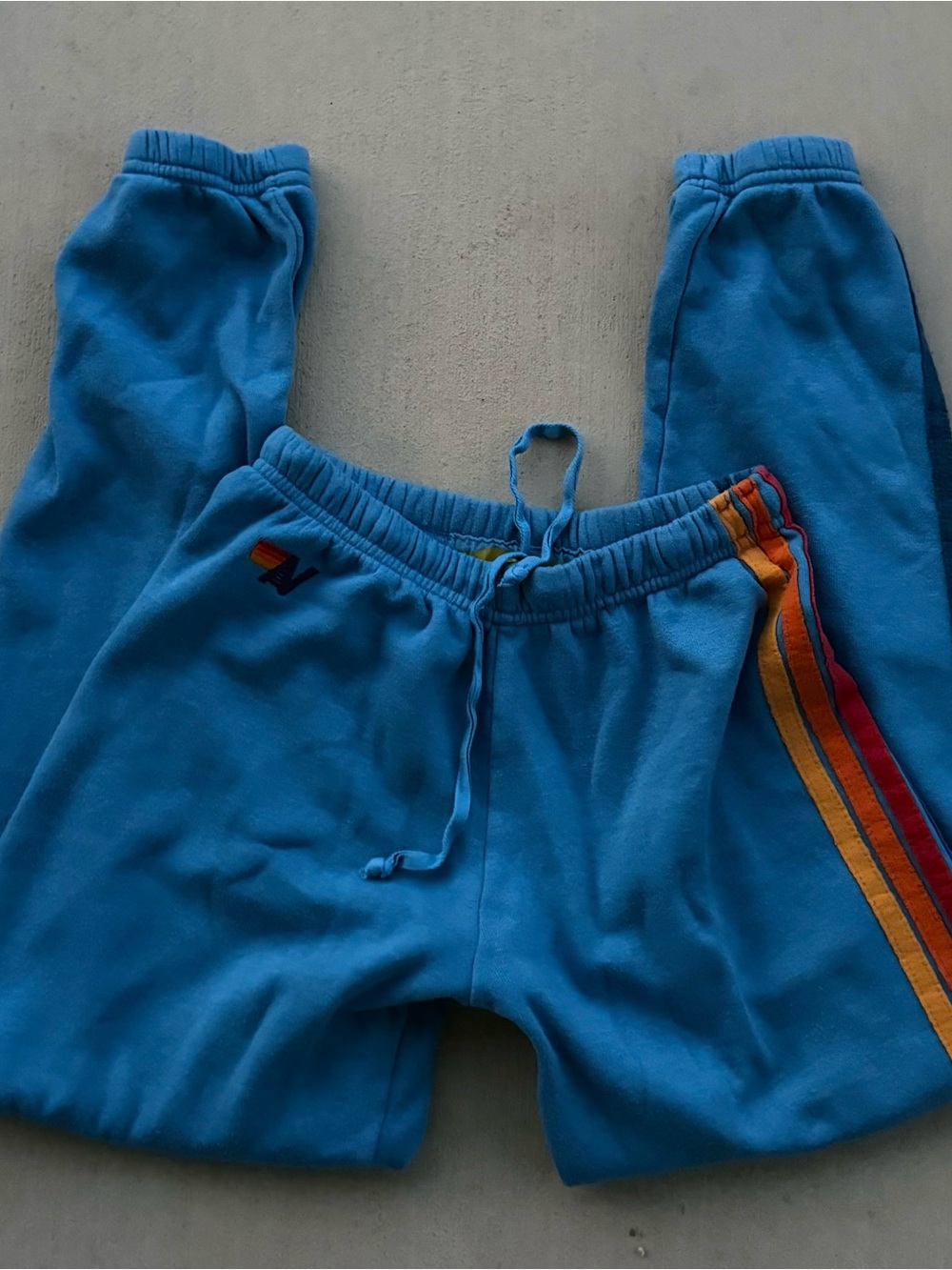 Aviator Nation Bright Blue Joggers with Rainbow Side Stripes